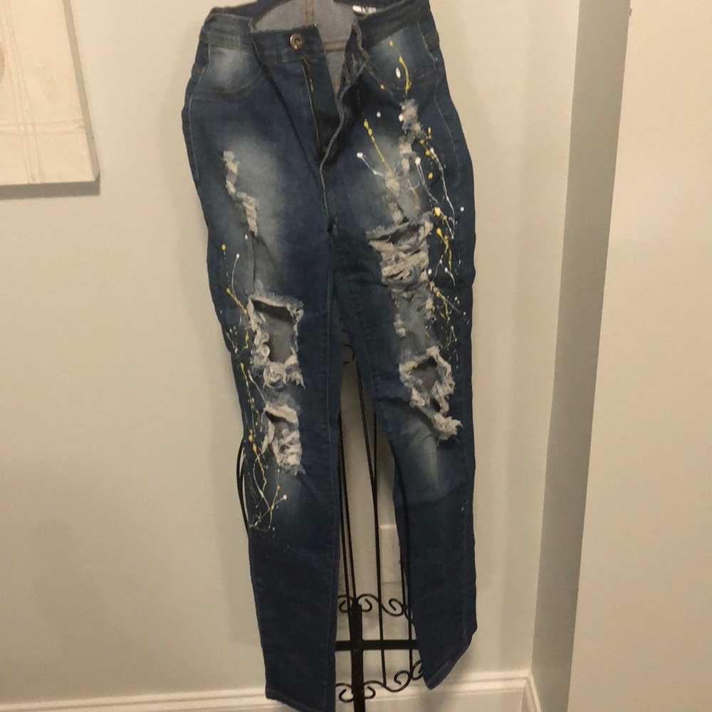 Fashion Nova splattered and tattered jeans